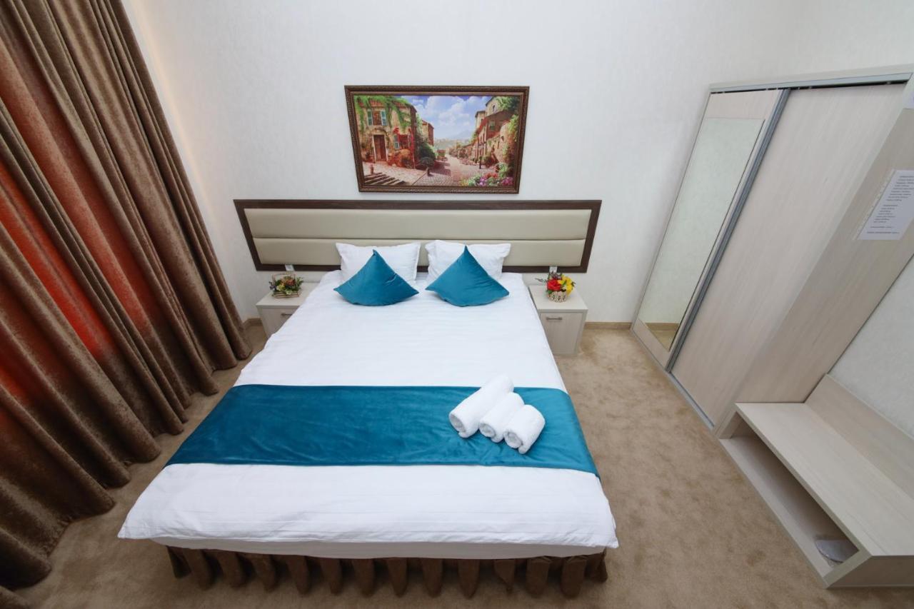 Hotel Globus Tasken Kültér fotó